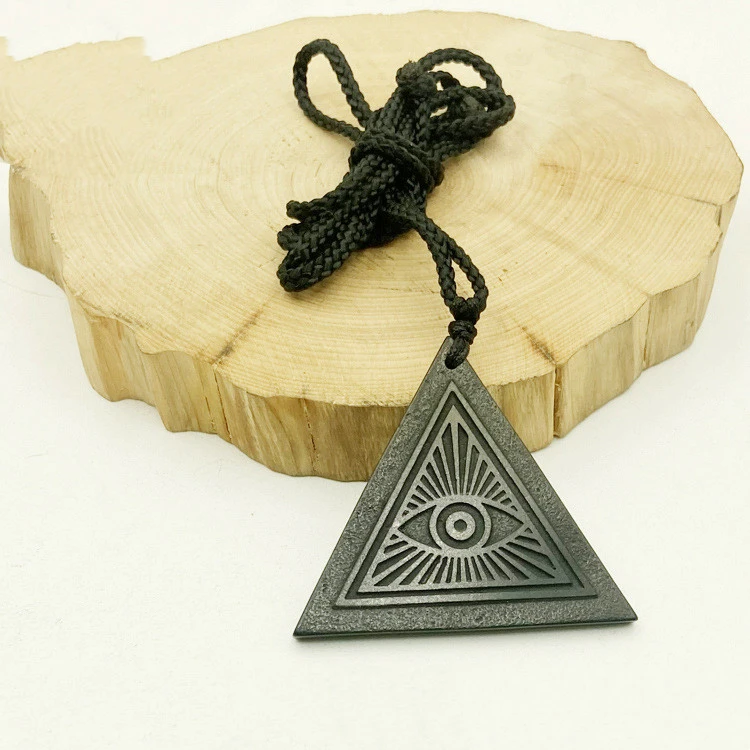 Triangular Pendant Carved In Rough Stone