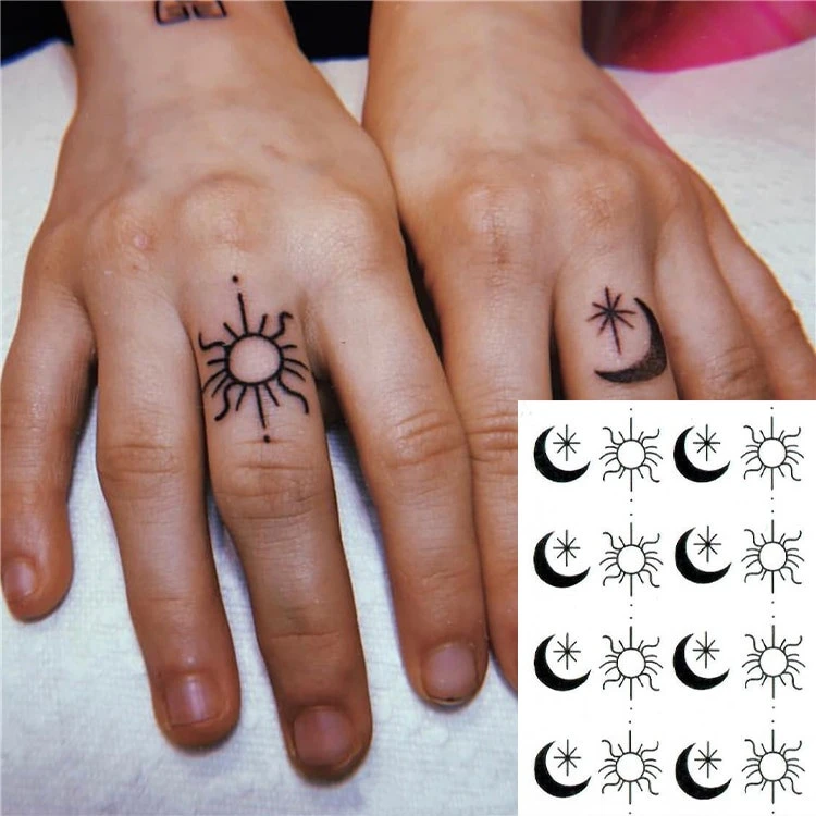 Dark Black And White Sun Moon Finger Tattoo