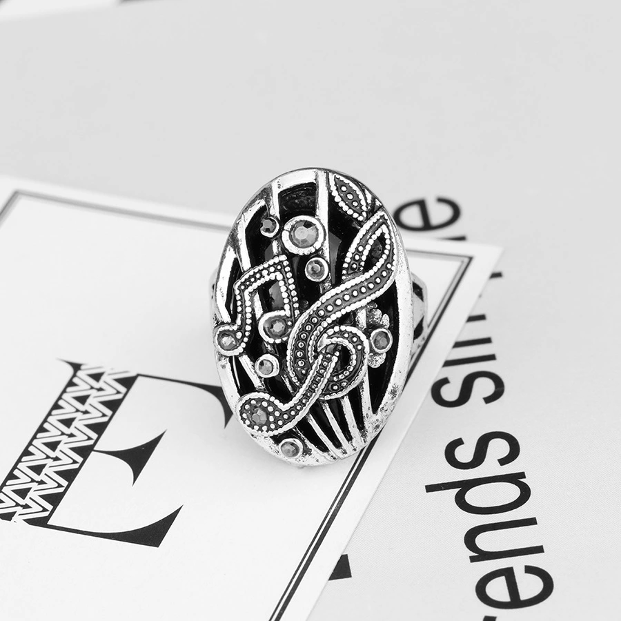 Hollow Carved Music Symbol Retro Ring