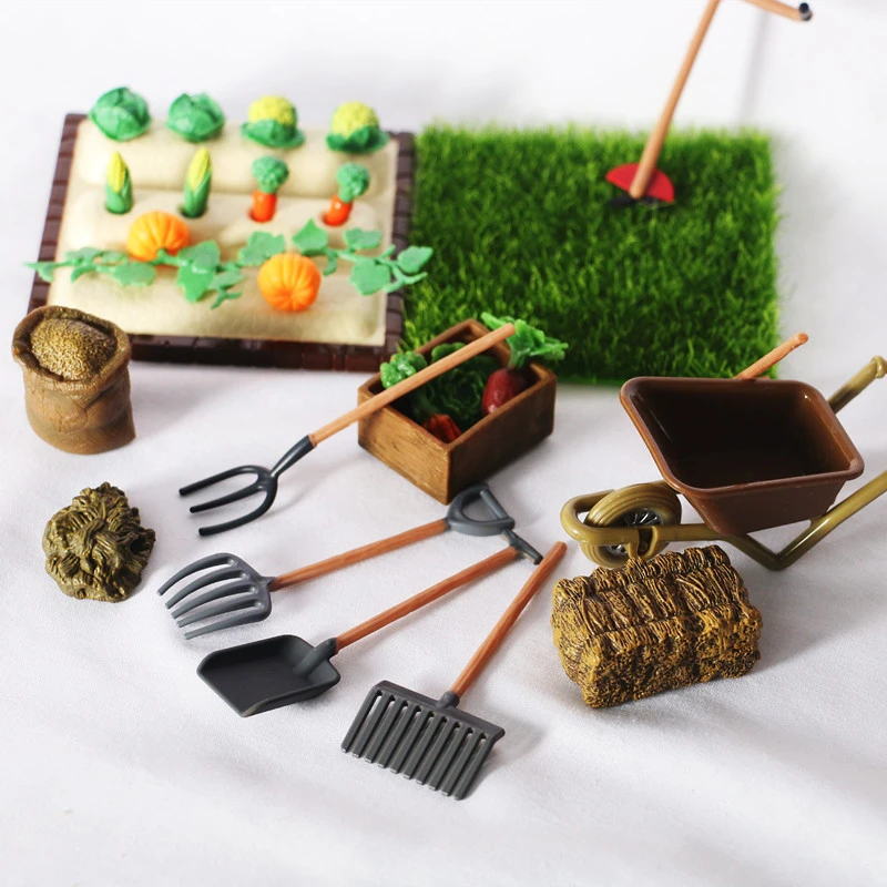 Outdoor Planting Scene Of Mini Farm Shovel And Harrow