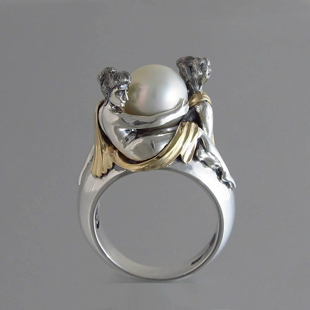 Elegant Lady Holding Black Pearl Two Tone Ring