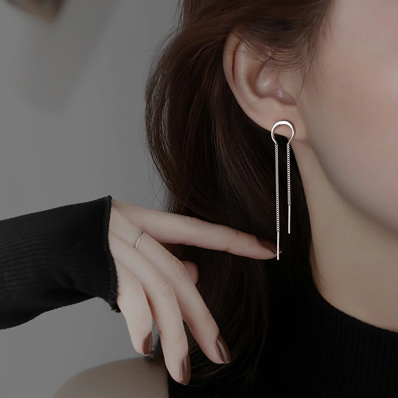 Silver Curved Crescent Sue Earrings Are Light And Luxurious