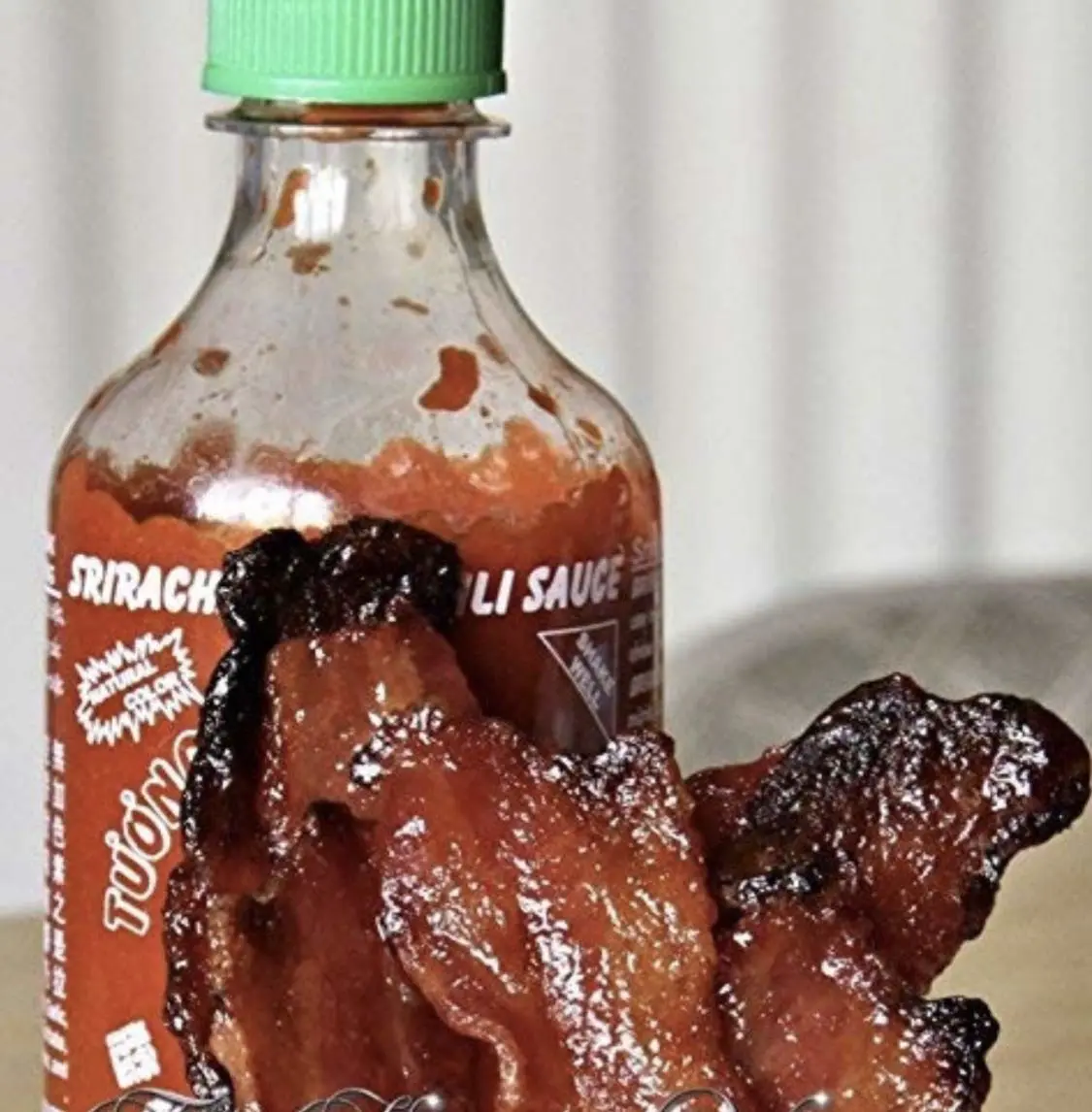 JURASSIC JERKY’S Carnivore Carnivore Candy Bacon Jerky - Spicy Sriracha Flavor - Single Pack - (1) 2 oz bag
