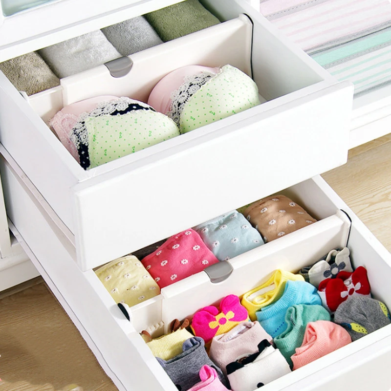 Adjustable cabinet storage box