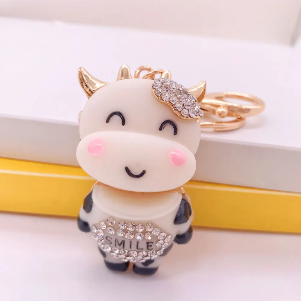 Zodiac Creative Metal Rhinestone Resin Smile Cow Car Keychain Pendant