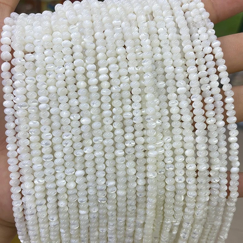 Natural Horseshoe Snail Abacus Beads Scattered
