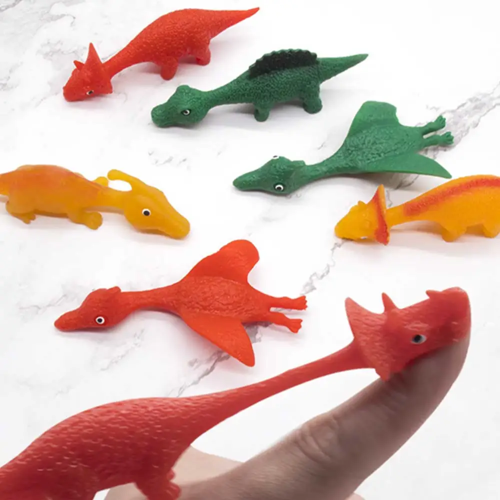 5Pcs Creative Dinosaur Shaped Launching Stress Relief Toy TPR Finger Slingshot Decompression Toy Random Style