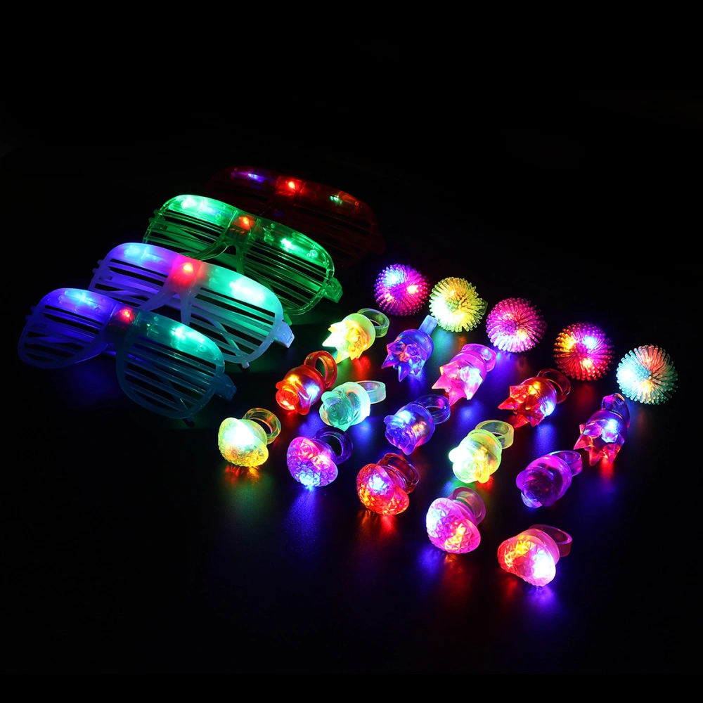 TOYMYTOY 16pcs Flashing Slotted Shades Glasses & LED Flashing Rings LED Light Up Toy Party Favor (4pcs Red & Green & Blue & White Glasses + 12pcs Rings with Various Patterns in Random Colors)