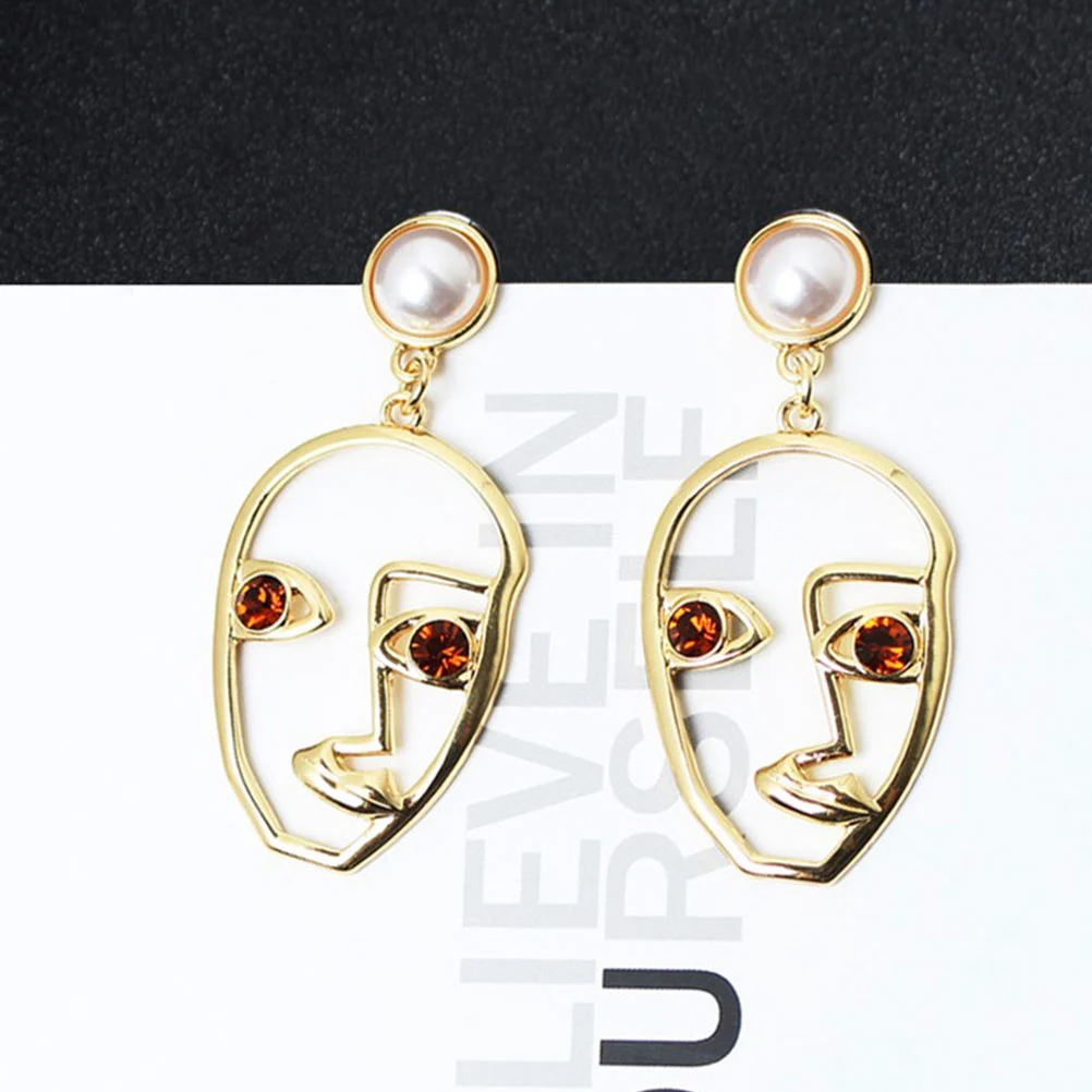 1 Pair of Earrings Hollow Artistic Temperament Abstract Human Face Female Earrings (Orange Eyes)