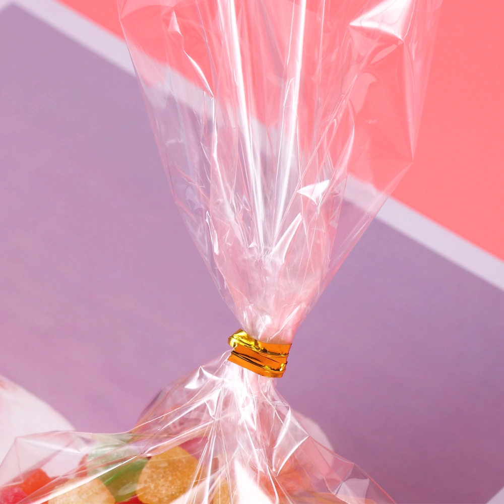 OUNONA 100pcs Clear Treat Bags Cellophane Bags with 100pcs Golden Ties for Candy Bread Chocolate Jelly