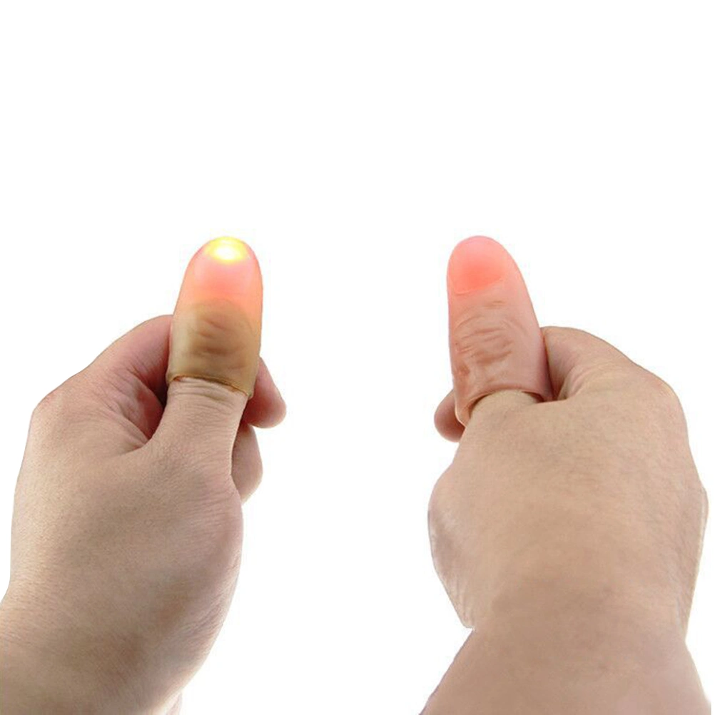 Trick Thumb Tip Light Thumb Tip Toy Super Bright Flashing Finger Lamp(Random Color)