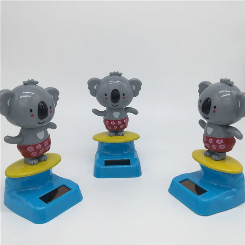 2pcs of One Set Adorable Koala Doll Solar Car Layout Creative Auto Shake Head Dolls Desktop Ornament