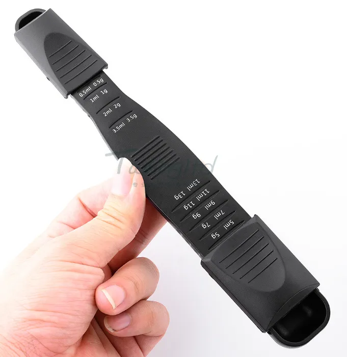 1 * Adjustable Measuring Spoon
Food Grade ABS
21.5 cm * 3.5 cm * 2.4 cm / 8.5 inch * 1.4 inch * 0.9 inch