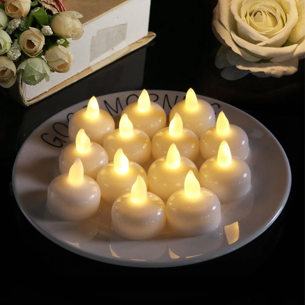 4Pcs Waterproof Decorative Small LED Floating Candles for Wedding Party SPA Bath (Warm White Light)