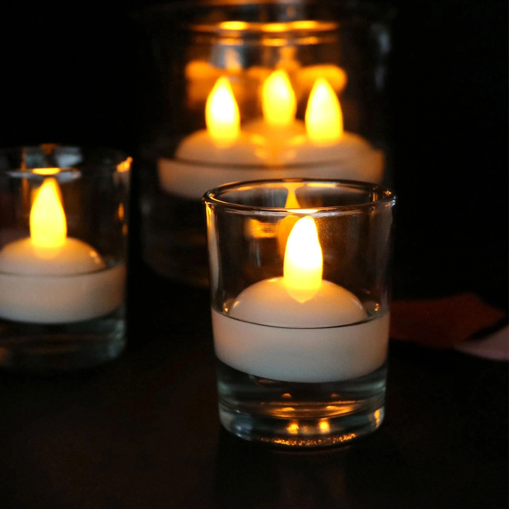4Pcs Waterproof Decorative Small LED Floating Candles for Wedding Party SPA Bath (Warm White Light)