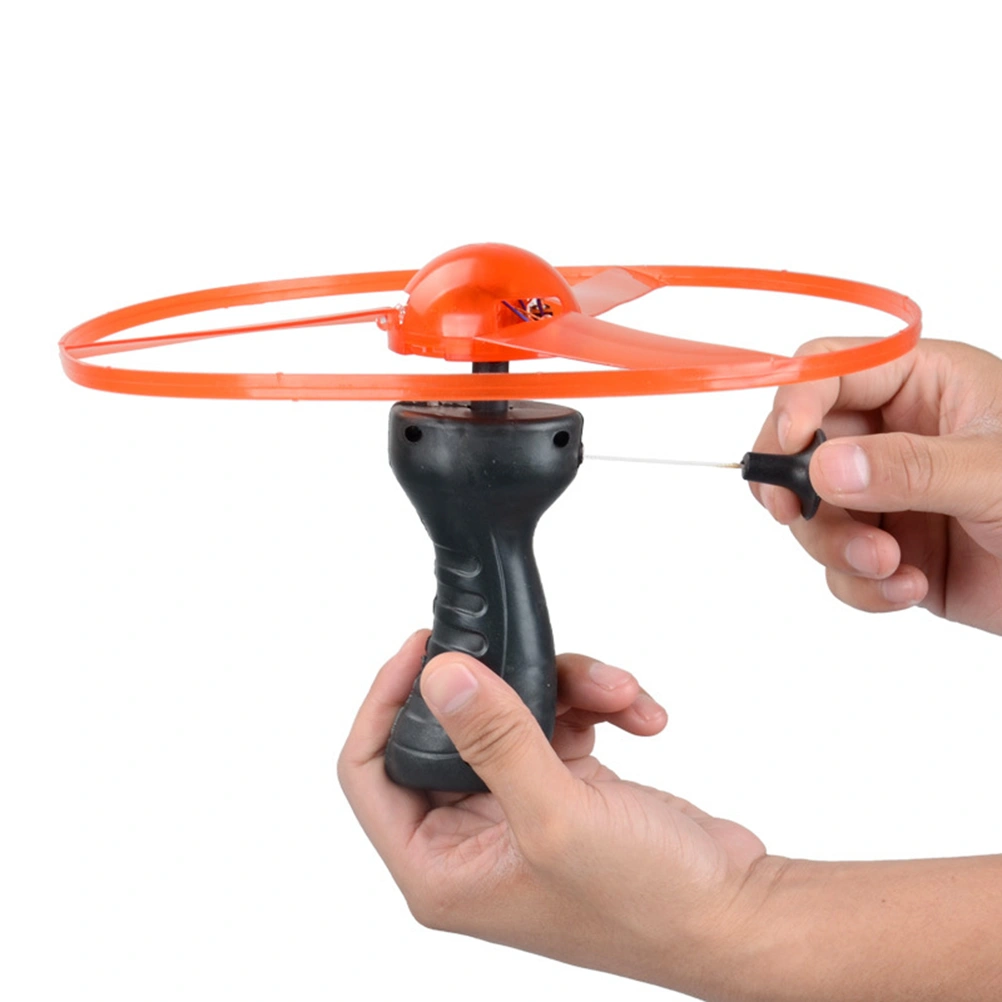 Random Funny Colorful Pull String UFO LED Light Up Flying Saucer Disc Kids Toy