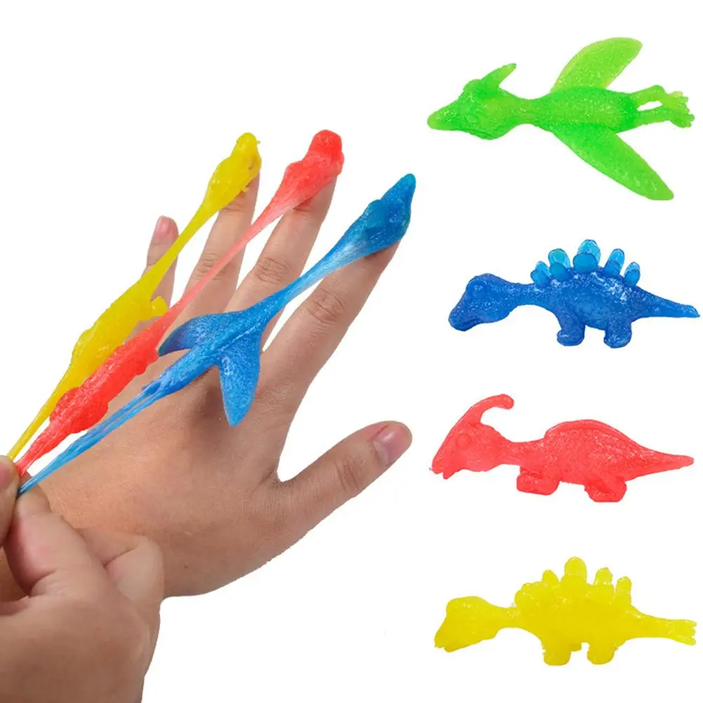 10Pcs Funny Catapult Launch Dinaosaur Turkey Toy Practice Elastic Flying Finger Sticky Toys