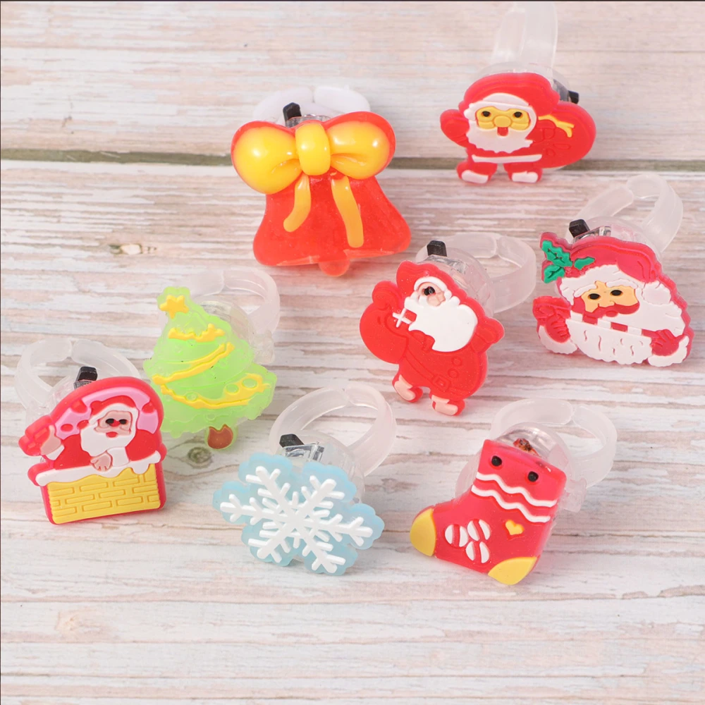 15pcs Christmas Creative Finger Ring Luminous Rings Flashing Toys Party Favors Gifts(Random Pattern)