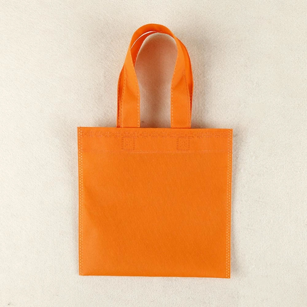 12PCS 15x15cm Solid Color Eco-Friendly Handbags Portable Tote Bags Nonwoven Storage Pouches Packaging Bags (Random Color)