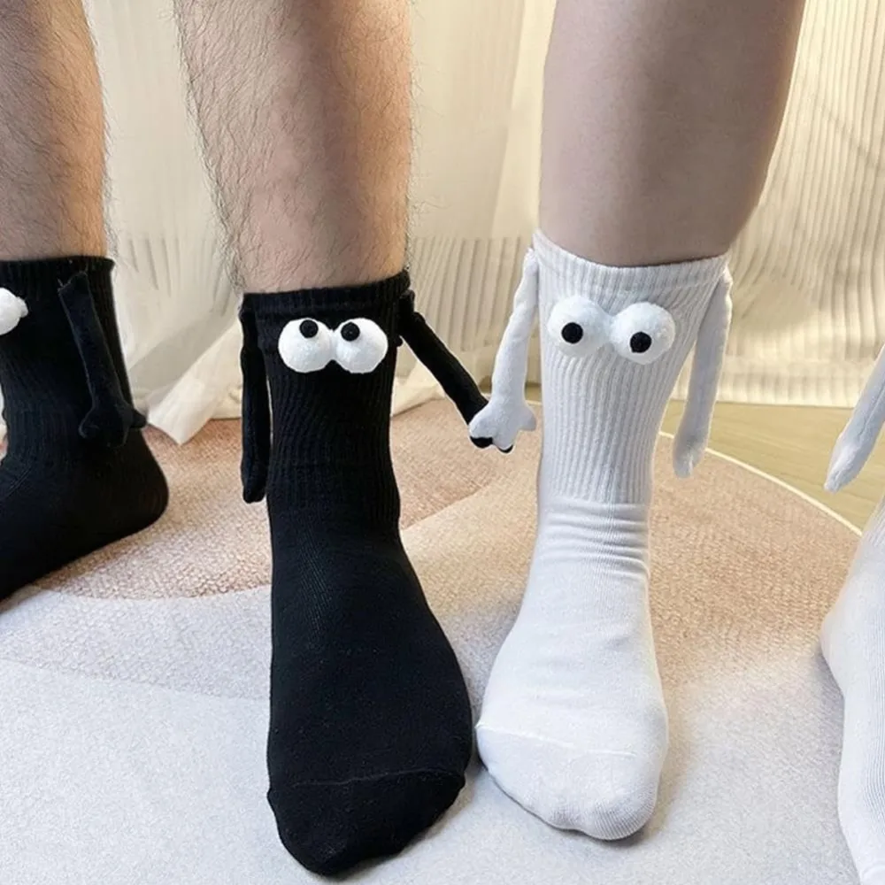 Black and White Cartoon Eyes Magnetic Attraction Hand in Hand Couple Socks