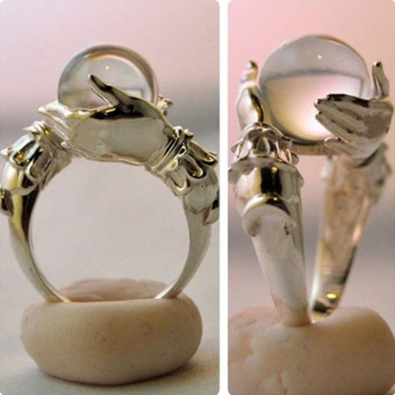 European and American Fashion Creative Hand Holding A Bead Ring