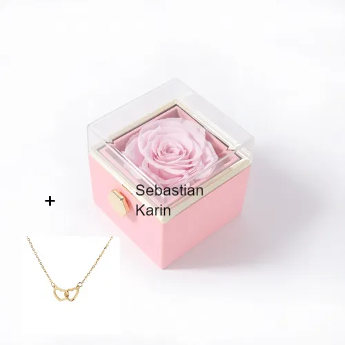 Sebastian and Karin engraved on necklace