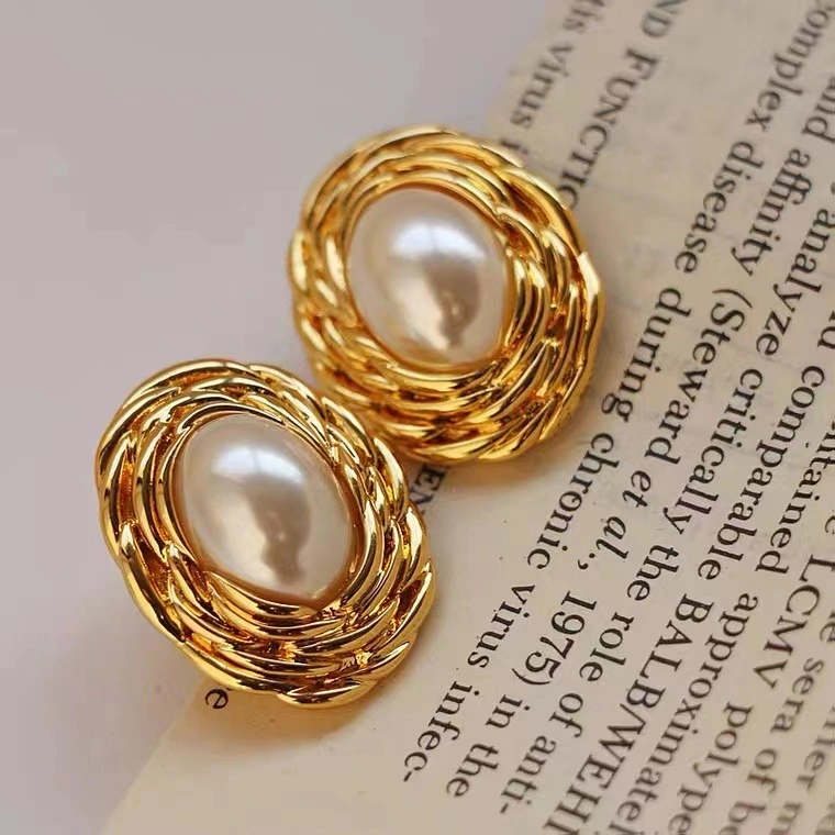 Light Luxury High-grade Retro Gold Niche Design Women's Autumn And Winter Unique Earrings