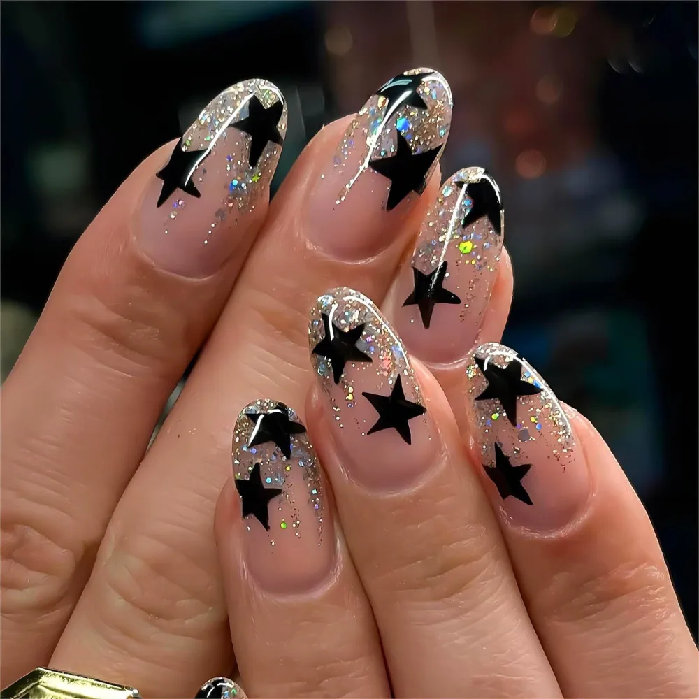 Medium Press on Nails Almond False Nails Pink Acrylic Fake Nails with Black Star Designs Gold Glitter Artificial Reusable Natural Stick on Nails for Women 24Pcs