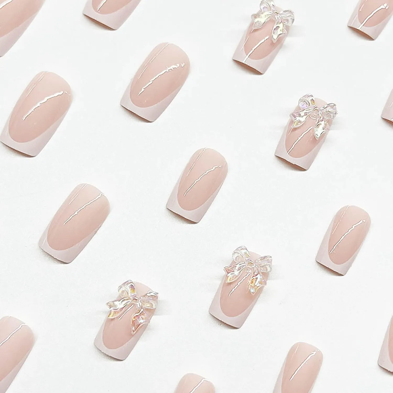 Cute Press on Nails Short Square SWEKKE French Tip Fake Nails Nude Pink Full Cover False Nails with Crystal Bow Charm Designs Glossy Glue on Nails Acrylic Artificial Nails for Women Girls 24Pcs