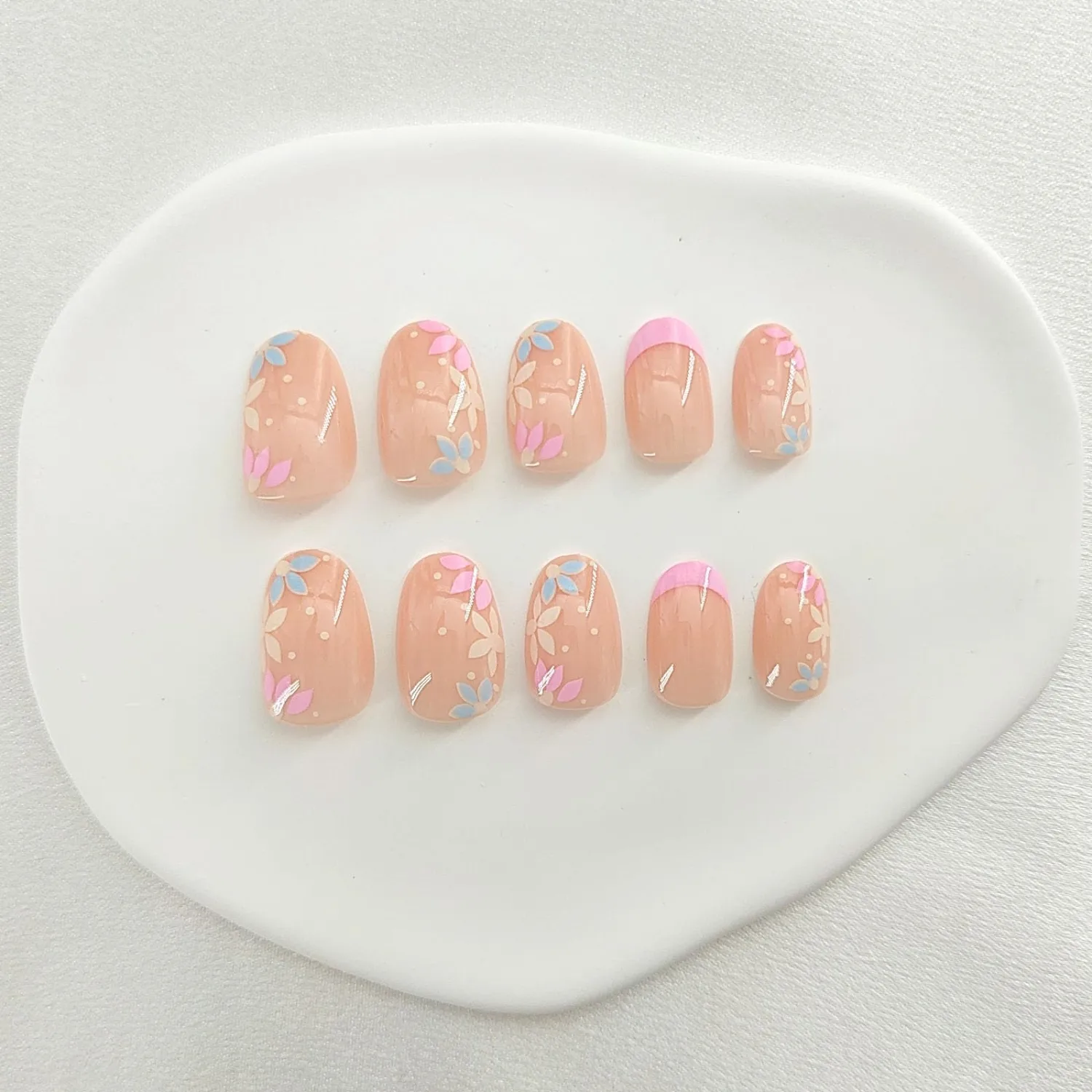 Press on Nails Short Oval False Nails Pink Blue French Tip Fake Nails Floral Design Nails Nude Full Cover Acrylic Nails Cute Nails Glossy & Spring Stick on Nails for Women 24 Pcs