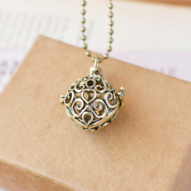 Vintage Heart Hollowed-out Fragrance Ball Pendant Necklace