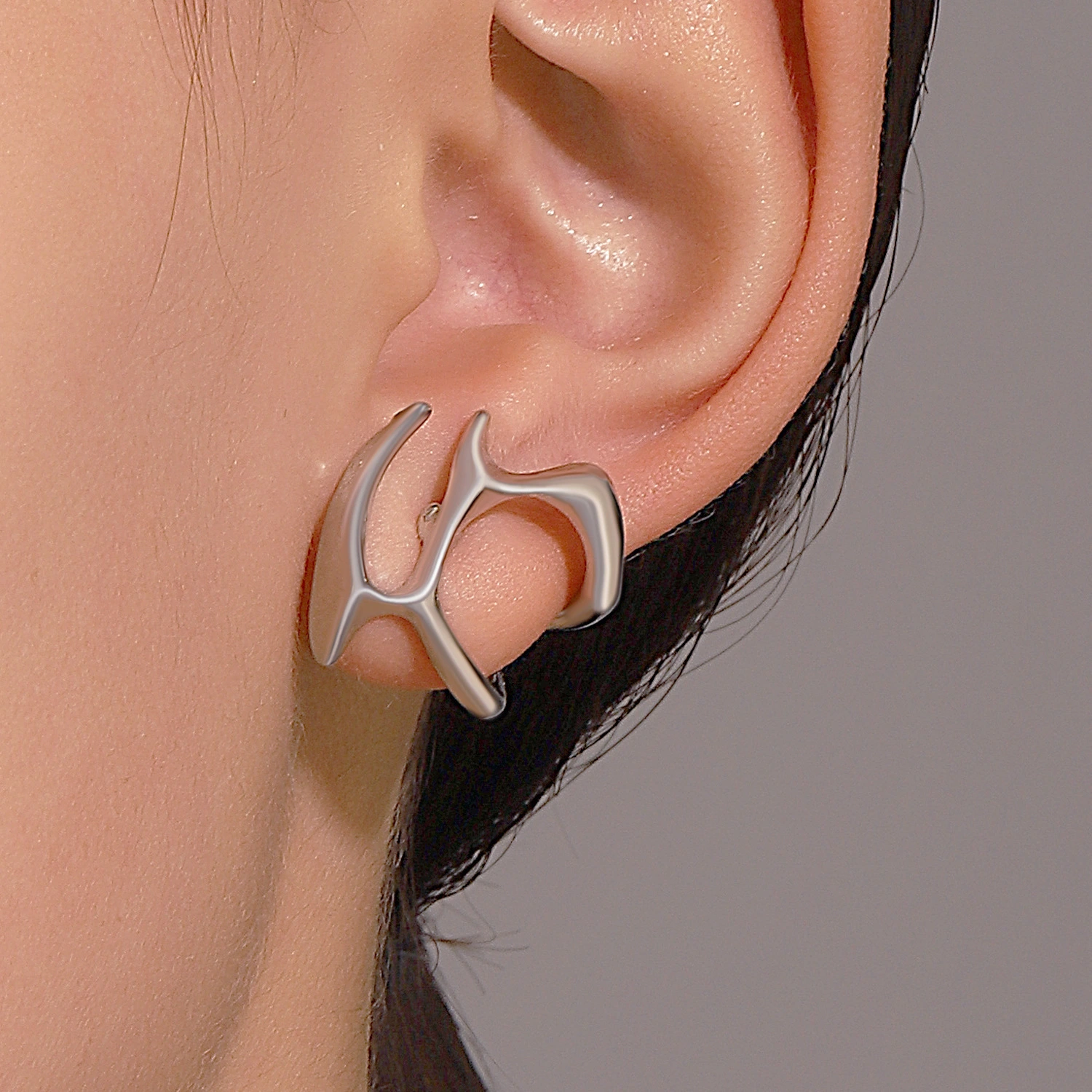 Cold Wind Irregular Liquid Hollow Ear Stud