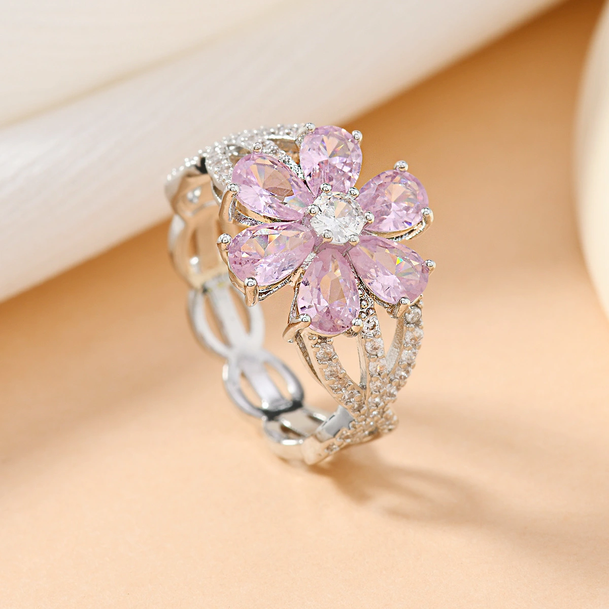 Copper-inlaid Cherry-blossom-pink Water-drop Zircon Flower Ring