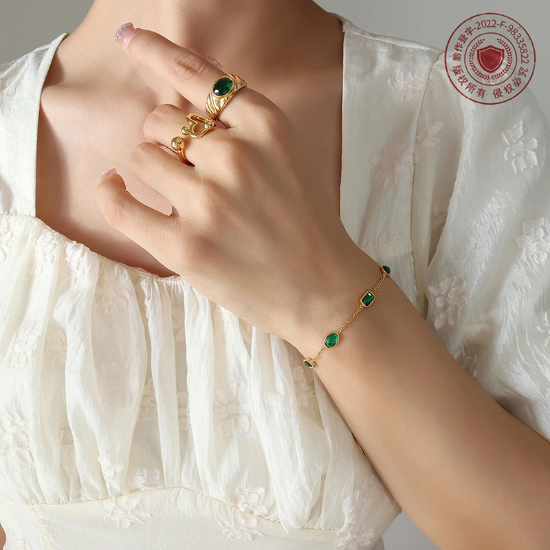 Emerald-inlaid Zircon Titanium Steel Gold-plated Bracelet