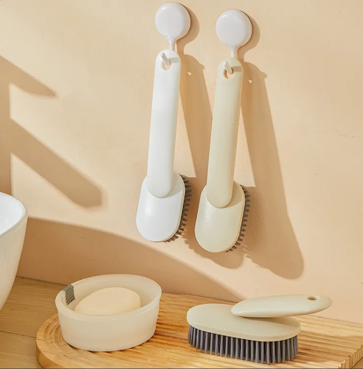 Shoe brush with inclined handle-cream color-bristle PET+ handle PP-1 piece