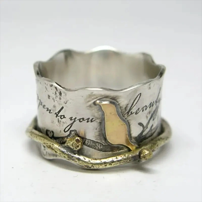 Custom-designed Retro Ring With A Wide Band And A Bird Motif