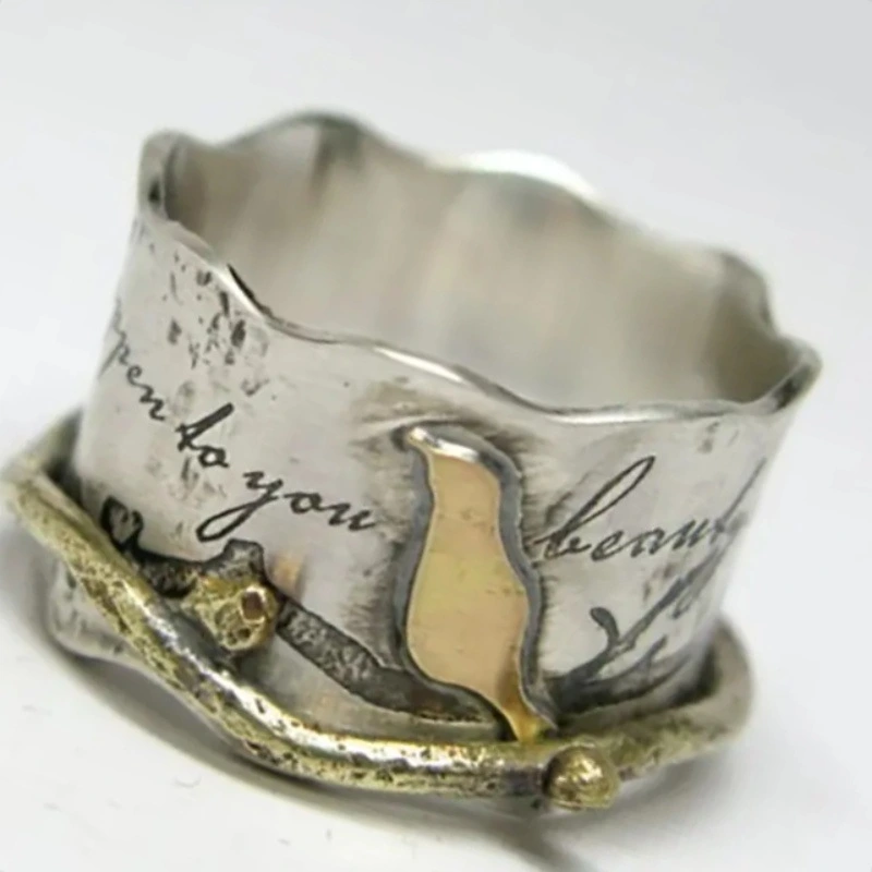 Custom-designed Retro Ring With A Wide Band And A Bird Motif
