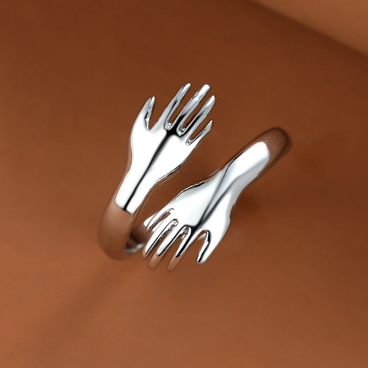 Couples Rings With Palms Spread Wide