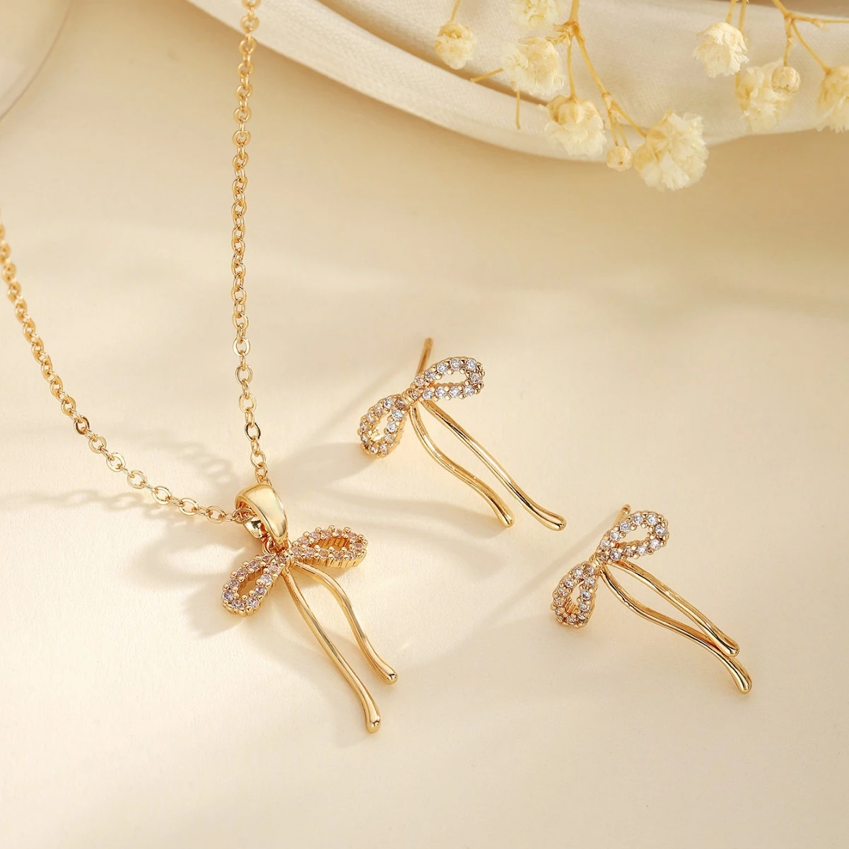 Copper Inlaid Zircon Bow Pendant Earrings Two-Piece Set