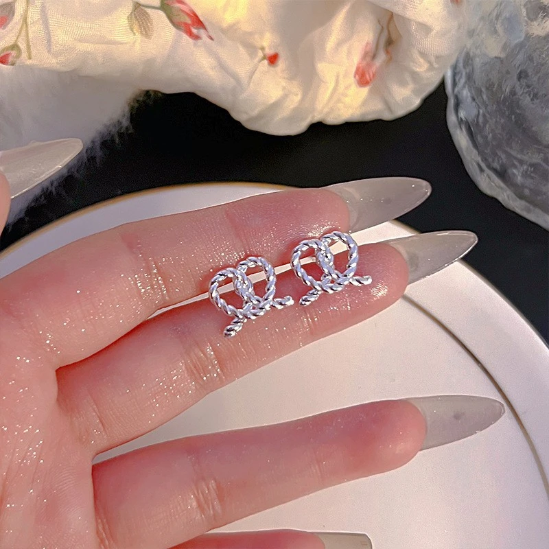 2026 New Silver Metal Stud Earrings Niche High End Design