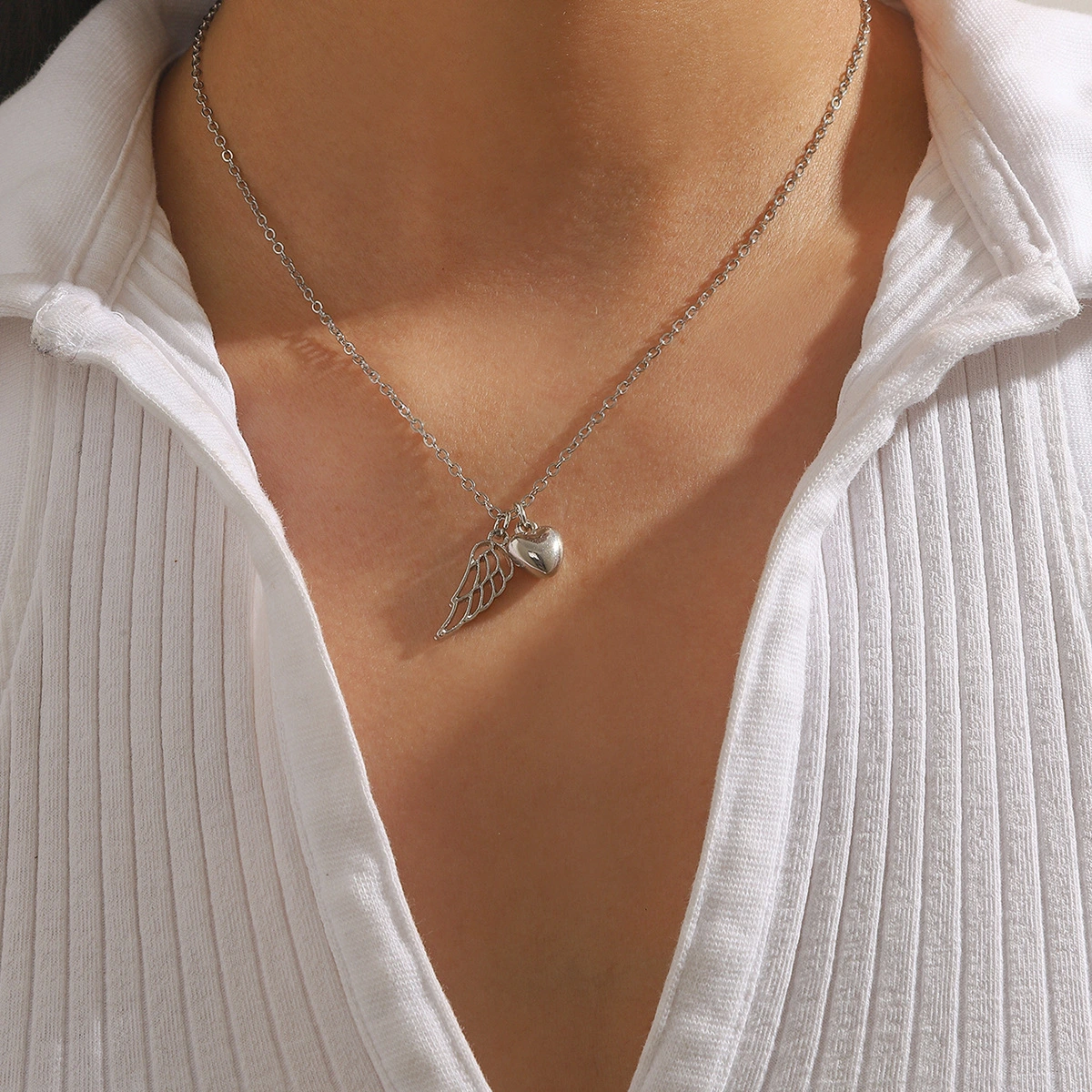 Minimalist Hollowed-Out Wing And Heart Necklace