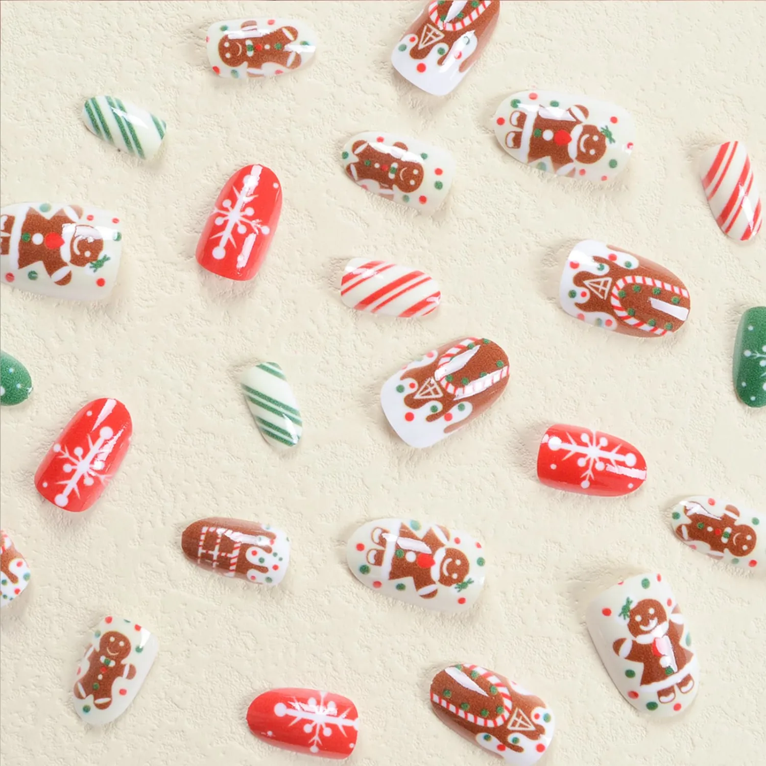 Christmas Press on Nails Short Almond Fake Nails with Gingerbread Man & Snowflake Designs Full Cover Acrylic False Nail Press Ons Glue on Nail for Women 24Pcs