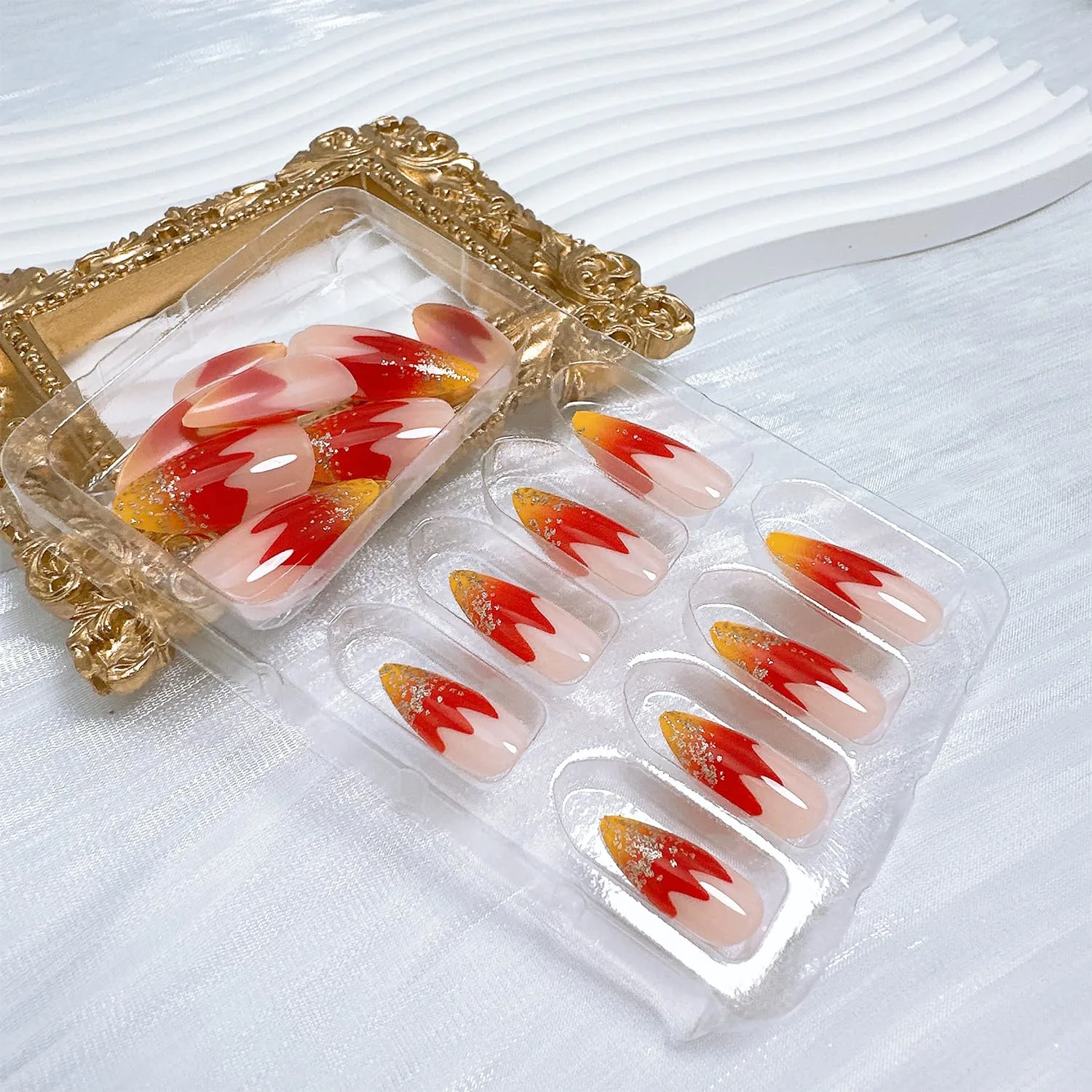 24pcs French Tip Press on Nails Medium Almond Fake Nails with Glitter Designs Flame False Nails Kit Gold Red Acrylic Nails Stick on Nails Full Cover Glue on Nails for Women Nail Decoration