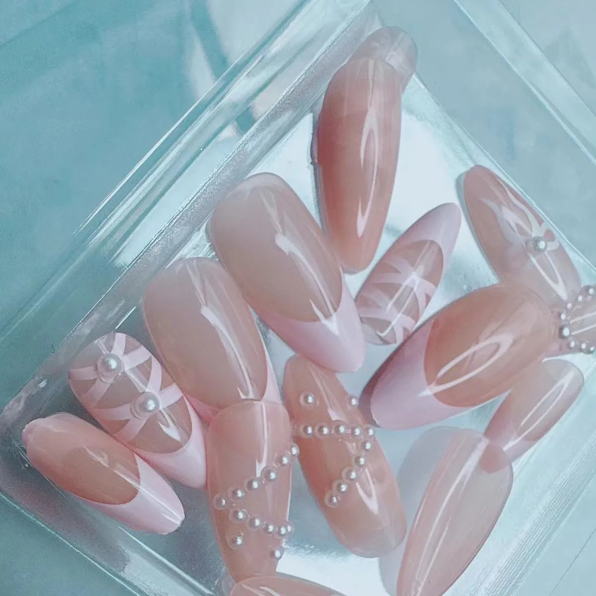 Light Pink French Tip Press on Nails Short Almond Fake Nails Glossy Full Cover Acrylic Nails Pearl Bow Cute Nails Gel Glue on Nails Nude Pink False Nails Stick on Nails for Women Girls 24Pcs