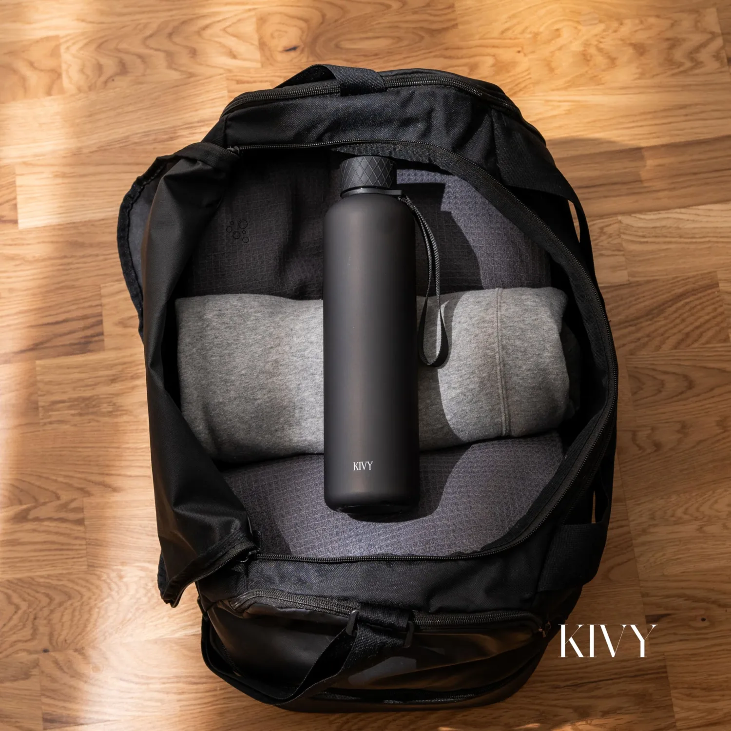 KIVY Slim Water Bottle 32oz [Lightweight & Shatterproof] - Reusable Tritan Water Bottle - Leak Proof Water Bottle for Women & Men - No Spill - Dishwasher Safe - Black