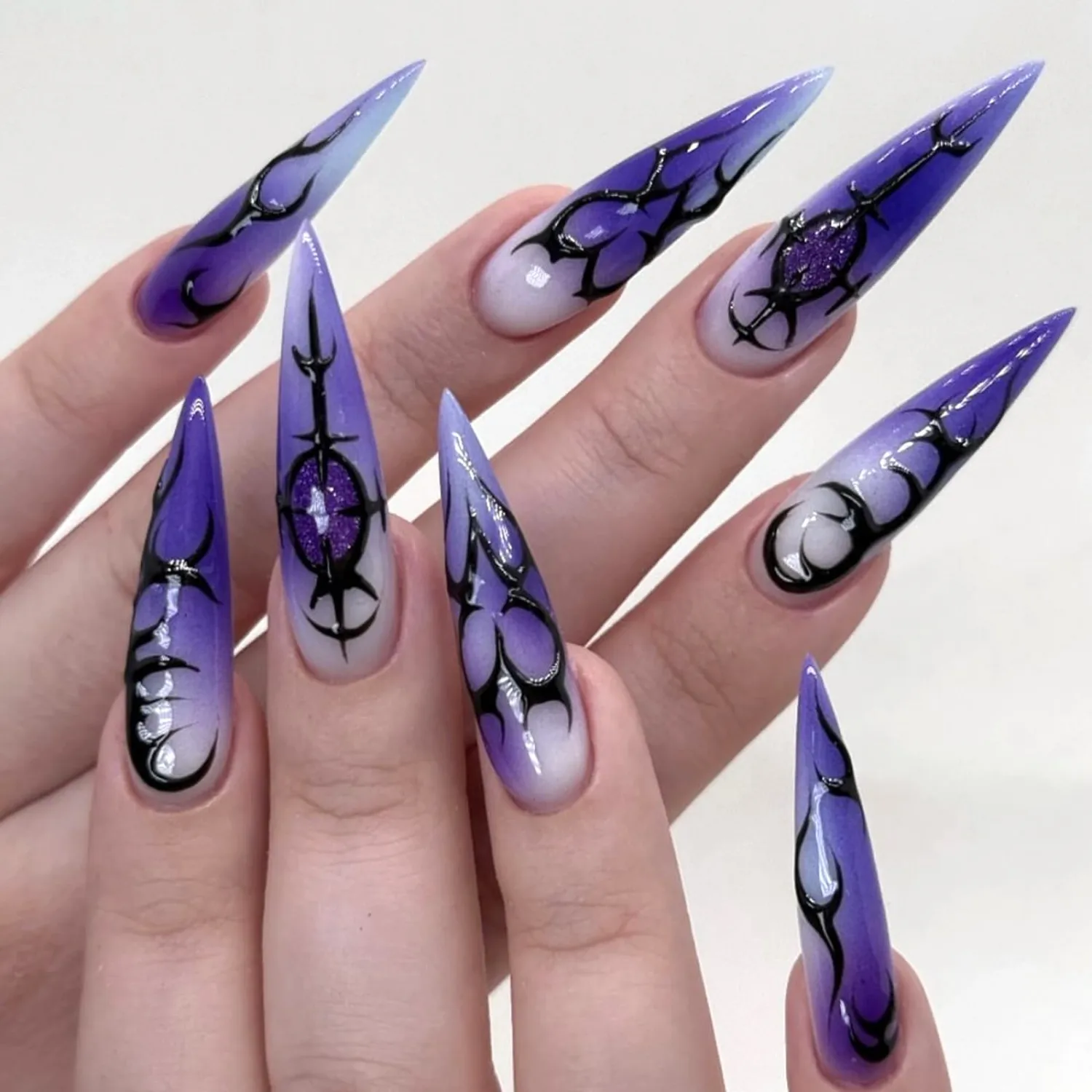 Halloween Press on Nails Long Stiletto Gradient Purple Fake Nails with Irregular Lines Design Glossy Glue on Nails Purple Glitter False Nails Full Cover Stick on Nails for Women 24Pcs